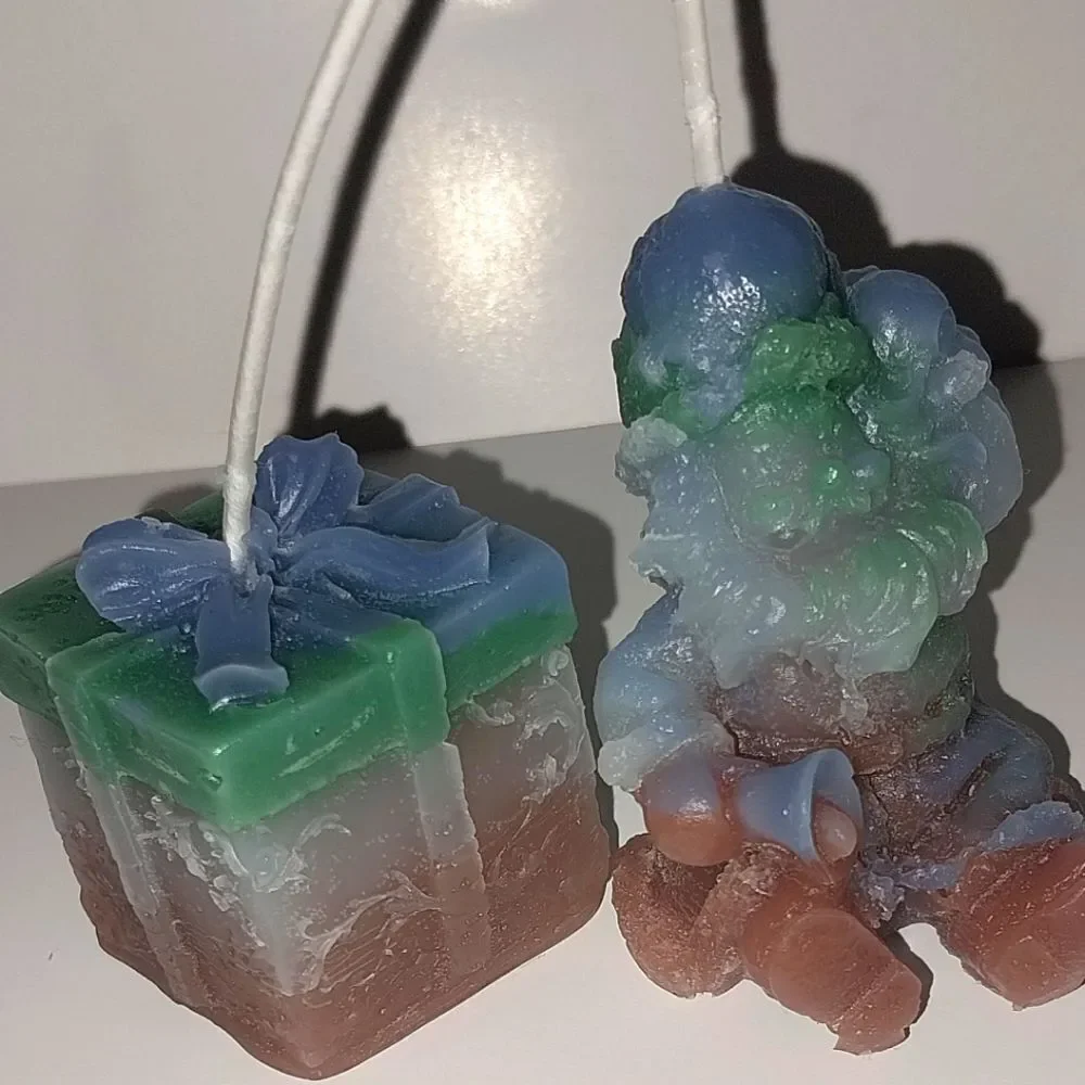 Hand crafted 2 piece holiday Santa's present candle set